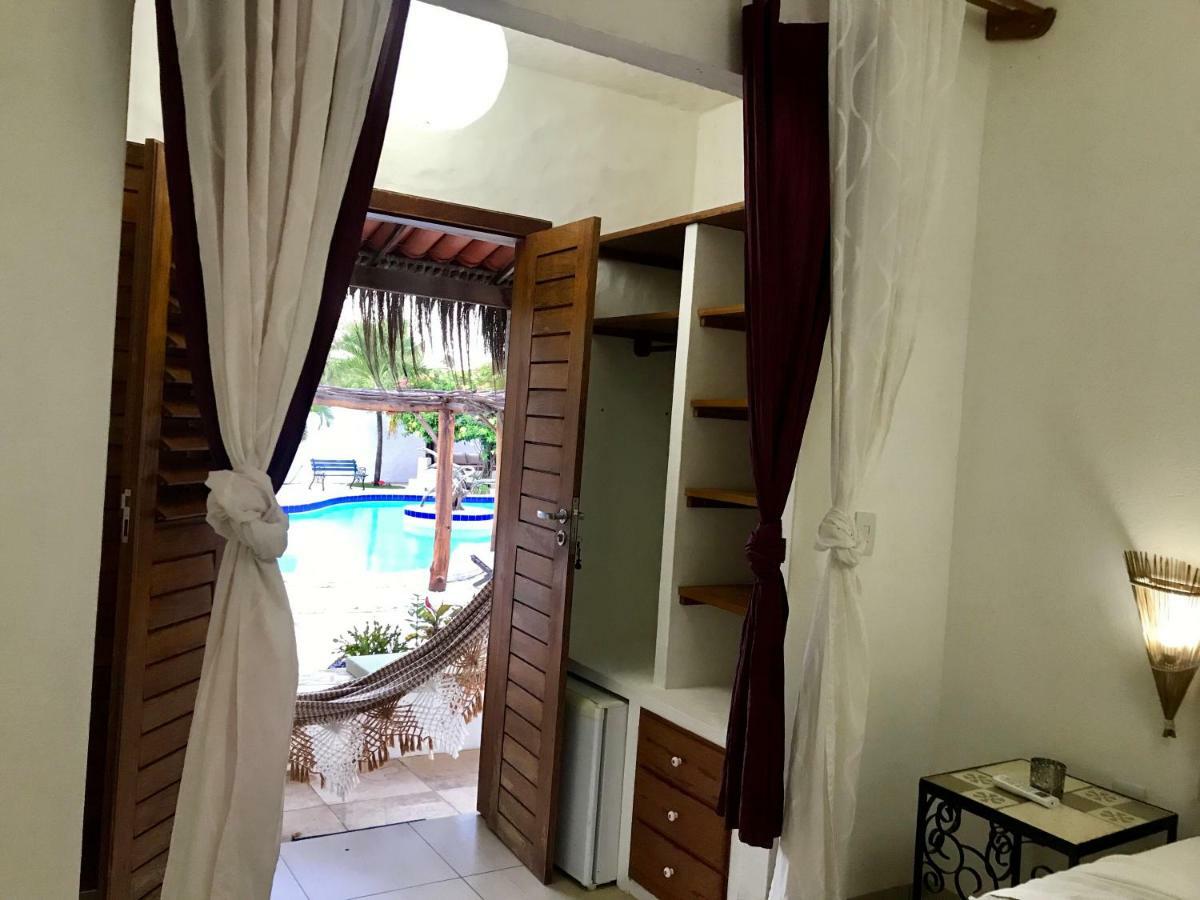 Quarto Triplo com Vista para a Piscina